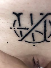 Huendin bears a permanent tattoo