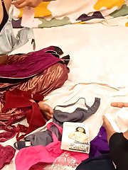 A village woman gets intimate with a vendor of bras.