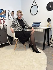 Pretty blonde mature Diana at the office in black pantyhose a steamy scene